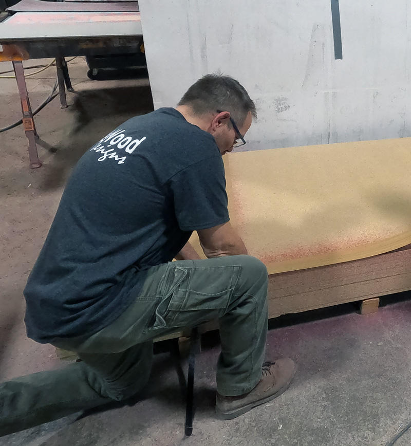 Working In Shop On Door